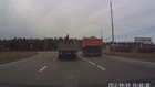 Overloaded truck shows us a new way to salt the road.