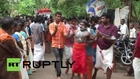 India: See people get cheeks pierced and hoisted into air on hooks