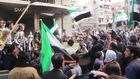 Syrian demanding the downfall of the genocidal Assad Regime