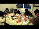 Japanese teens shows how to do origami.