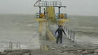 Jumping into the sea during stormy weather