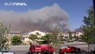 Firefighters battle fast-moving California wildfire