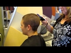 Video Girl buzzes all her hair off for cancer program