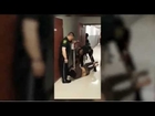 Deputy drags cuffed crying woman through courthouse hallway by her feet