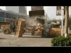 Watch: Bulldozers Fight In Street