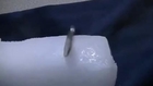 What happens if you insert a Coin into a Dry Ice Block
