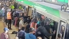 Commuters Band Together To Push A Train Off Trapped Passenger