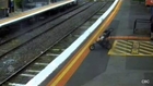 CCTV Footage Captures Toddler Landing On Train Tracks