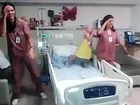 DANCING CANCER PATIENT!!  Nurses dancing with a little girl!