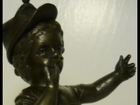 This antique bronze drummer boy sculpture statue is from the civil war era